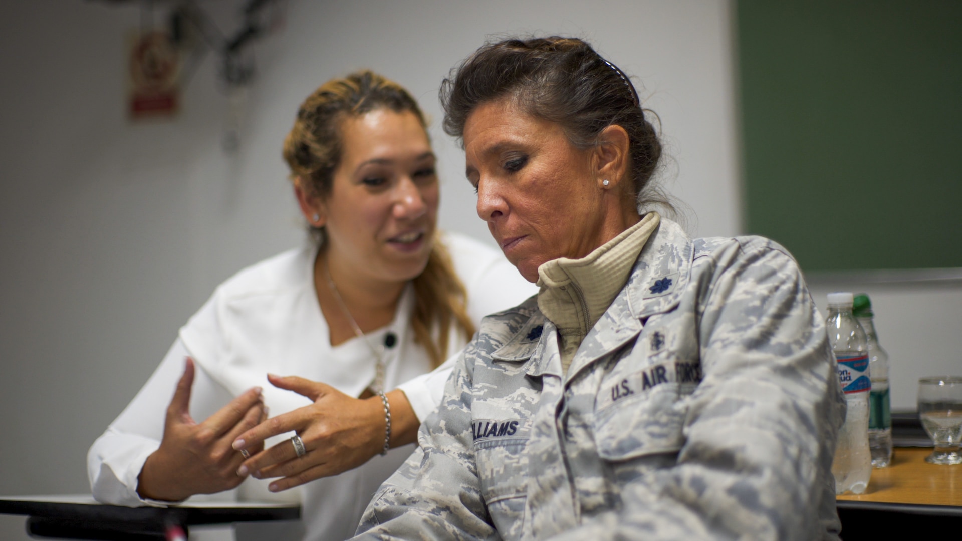 U.S. Air Force Lt. Col. Kellie Williams, 12th Air Force (AFSOUTH) Deputy Command Surgeon, speaks with an Argentinian counterpart during a senior leader engagement as part of the Department of Defense State Partnership Program Sep. 20 at the National Institute of Aeronautical and Space Medicine, Argentina.