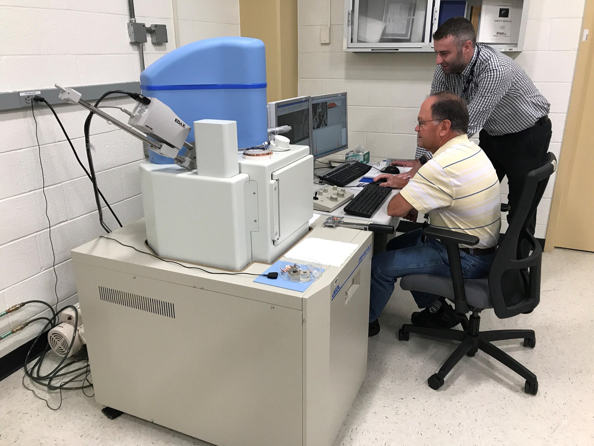AFRL Materials Integrity researchers review microscopic images