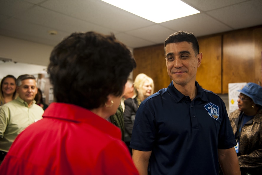 U.S. Air Force Col. Ricky Mills, 17th Training Wing commander, speaks with Meals for the Elderly staff at the Meals for the Elderly center San Angelo, Texas, Sept. 27, 2017. Meals for the Elderly is a private, non-profit charitable organization devoted to serving the homebound elderly of San Angelo by delivering a warm meal to those enrolled in the program. (U.S. Air Force Photo by Senior Airman Scott Jackson/Released)