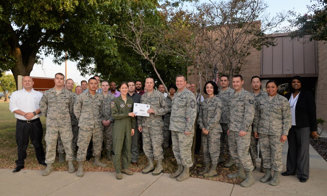 Senior Airman Christopher Arnold, 47th Contracting Squadron contracting specialist, was chosen by wing leadership to be the “XLer,” for the week of Sept. 18. The “XLer,” a wing-level award program sponsored by Col. Charles Velino, 47th Flying Training Wing commander, and presented by Col. Michelle Pryor, 47th FTW vice commander, is awarded to those who consistently make outstanding contributions to their unit and Laughlin’s mission.