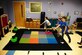 Alex Rowell, Near, Lucas Jessen, Middle, and Trenten Bunch, far, play bean bag toss during Day for Kids at the Joint Base Charleston Weapons Station Youth Center Sept. 21, 2017.