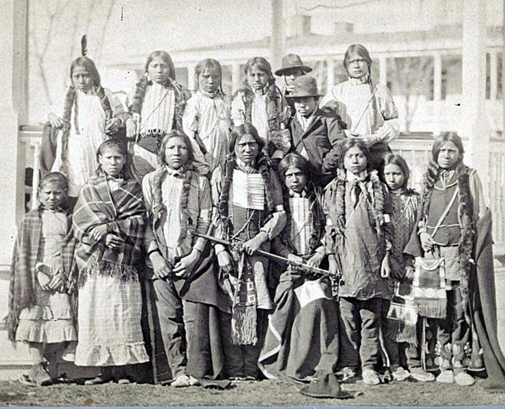 A group photo taken in the late 1800s shows Arapaho and Shoshone Indian children shortly after arriving at Carlisle Indian Industrial School in Pennsylvania.