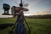 Tech. Sgt. Brian Thompkins, 921st Contingency Response Squadron weather forecaster, sets up a Tactical Airfield Weather Center at Roosevelt Roads, Puerto Rico, Sept. 25, 2017. A 70 member contingency response element from the 821st Contingency Response Group stationed at Travis Air Force Base, Calif., deployed to Puerto Rico in support of Hurricane Maria relief efforts. (U.S. Air Force photo by Staff Sgt. Robert Hicks)