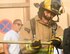 U.S. Air Force Senior Airman John Hodgkins, firefighter with the 379th Expeditionary Civil Engineer Squadron’s Fire and Emergency Services Flight, fits a tire with a slug hammer during a firefighter combat challenge at Al Udeid Air Base, Qatar, Sept. 1, 2017.