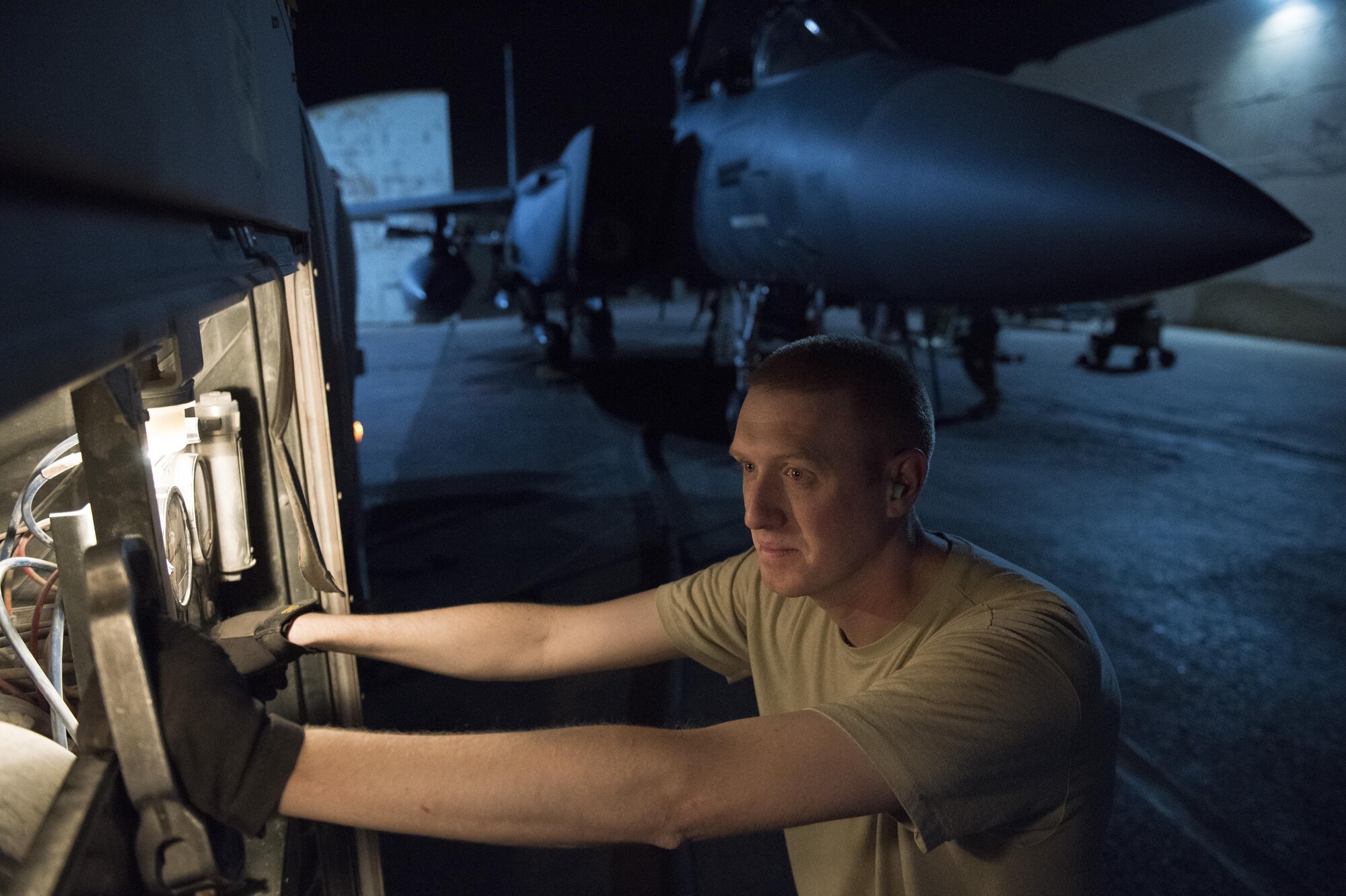 Staff Sgt. Kenneth Zaun, 332nd Expeditionary Logistics Readiness Squadron fuels flight controller, pumps fuel into a F-15E Strike Eagle, July 22, 2017 in Southwest Asia. The fuels flight operates a 24-hour shift, doing their part to ensure aircraft are mission ready. (U.S. Air Force photo/Senior Airman Damon Kasberg)