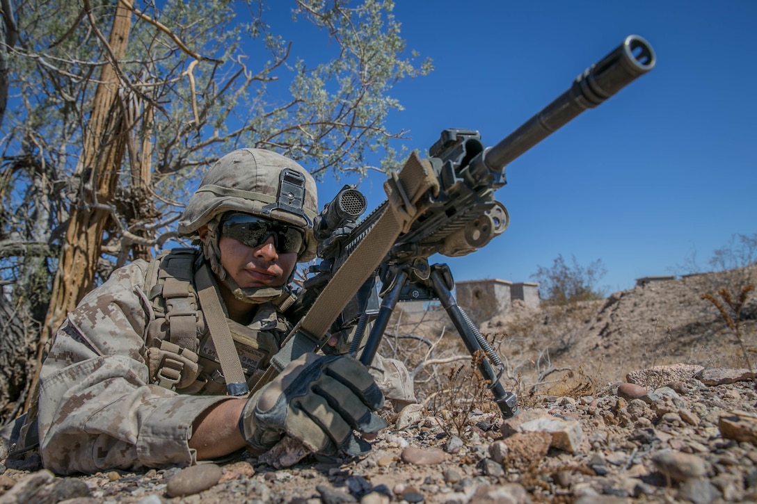 U.S. Marine Corps Lance Cpl. Alfredo Sandoval, an infantry Marine with Kilo Company, 3rd Battalion, 1st Marines, holds security for a rehearsal raid during Weapons and Tactics Instructors Course 1-18 at Yuma, Ariz., on Sept. 27, 2017. WTI is a seven week training event hosted by Marine Aviation and Weapons Tactics Squadron One  cadre which emphasizes operational integration of the six functions of Marine Corps Aviation in support of a Marine Air Ground Task Force. MAWTS-1 provides standardized advanced tactical training and certification of unit instructor qualifications to support Marine Aviation Training and Readiness and assists in developing and employing aviation weapons and tactics.