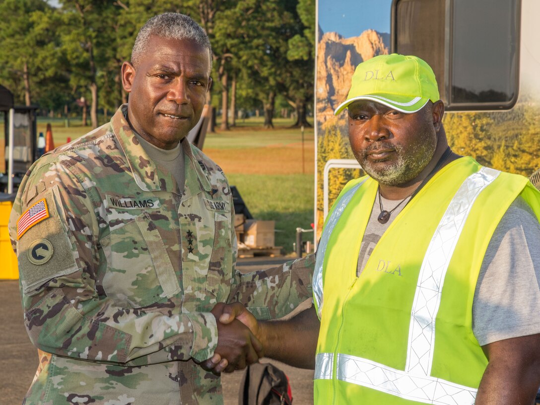 Lamar Buford, DLA Distribution Red River Expeditionary Team’s division chief (right) meets DLA director, Army Lt. Gen. Darrell Williams at Maxwell Air Force Base, Alabama.
