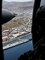 View from inside a U.S. Army helicopter as it flies over Roseau, Dominica.