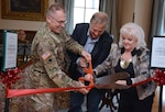 (From left) Maj. Gen. Brian C. Lein, commander, U.S. Army Medical Department Center & School; Guy W. Chipman III, Chipman Construction; and Joan Gaither, president of Preservation Fort Sam Houston, cut the ribbon during the Stilwell House rededication ceremony at Joint Base San Antonio-Fort Sam Houston Sept. 26.