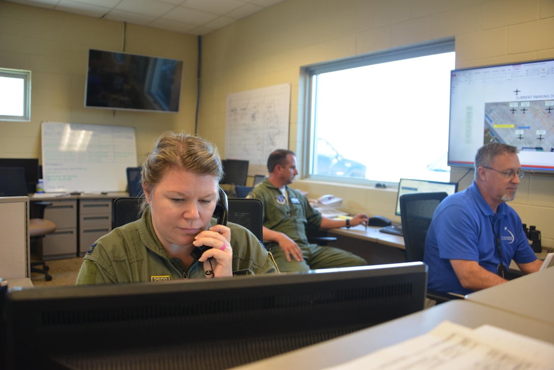 Air Force Capt. Erin Sayson, 165th Airlift Wing navigator, prepares for the arrival of Lt. Gen. Jeffrey S. Buchanan, U.S. Army North commander, at the Savannah Air Dominance Center in Georgia, Sept. 28, 2017. Buchanan traveled on an Air National Guard C-130H cargo aircraft to travel to Puerto Rico as the primary Defense Department liaison to the Federal Emergency Management Agency-led hurricane relief effort. Air National Guard photo by Staff Sgt. Chelsea Smith