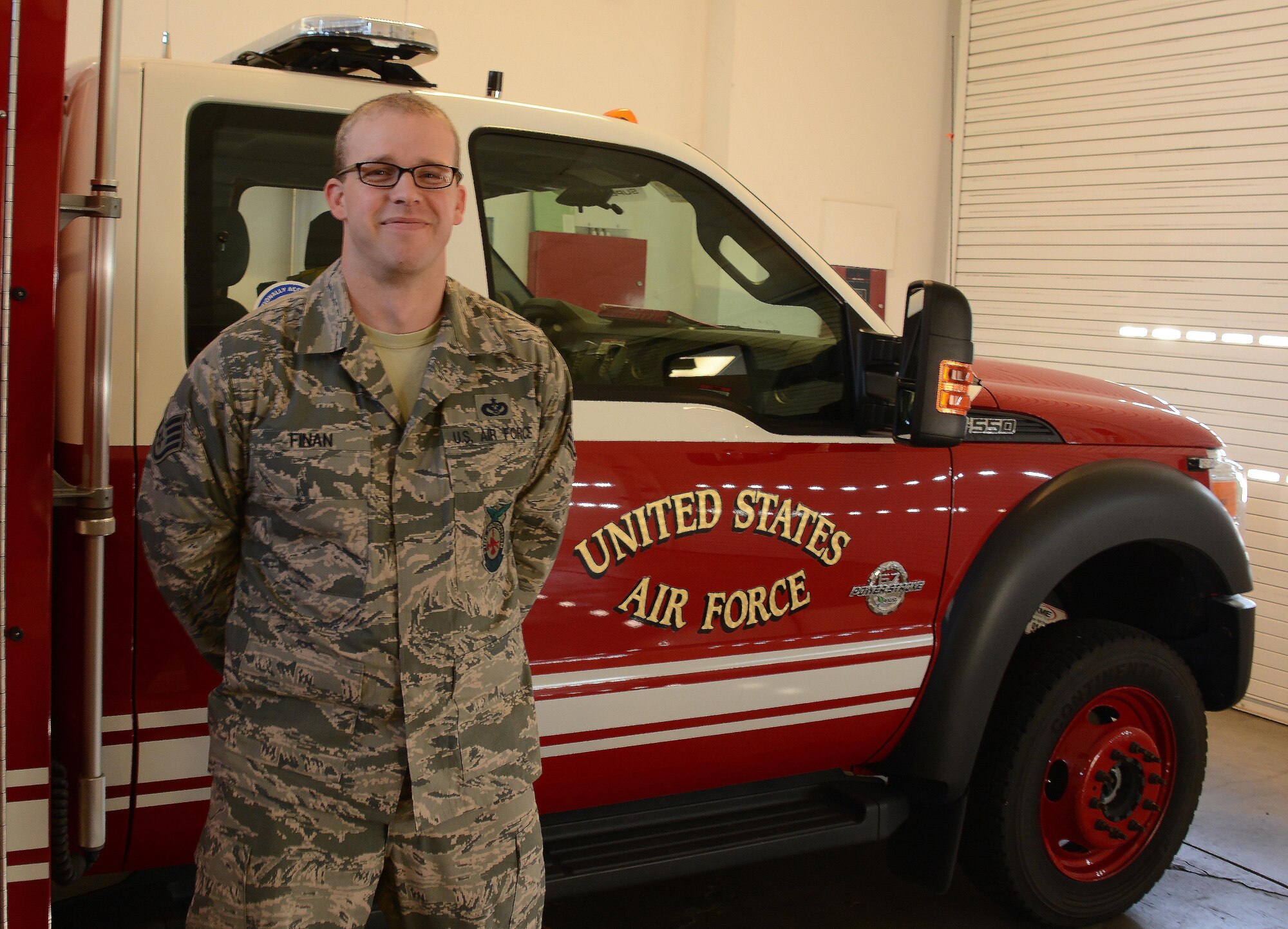 Staff Sgt. Scott B. Finan, a 60th Civil Engineer Squadron fire prevention inspector, stands ready to answer a fire emergency call at Fire Station No. 2 on Travis Air Force Base, Calif., Sept. 21, 2017. Fire Station No. 2 is scheduled to host the Fire Prevention Week open house on Saturday Oct. 14 at 10 a.m. (U.S. Air Force photo by Airman 1st Class Christian Conrad)