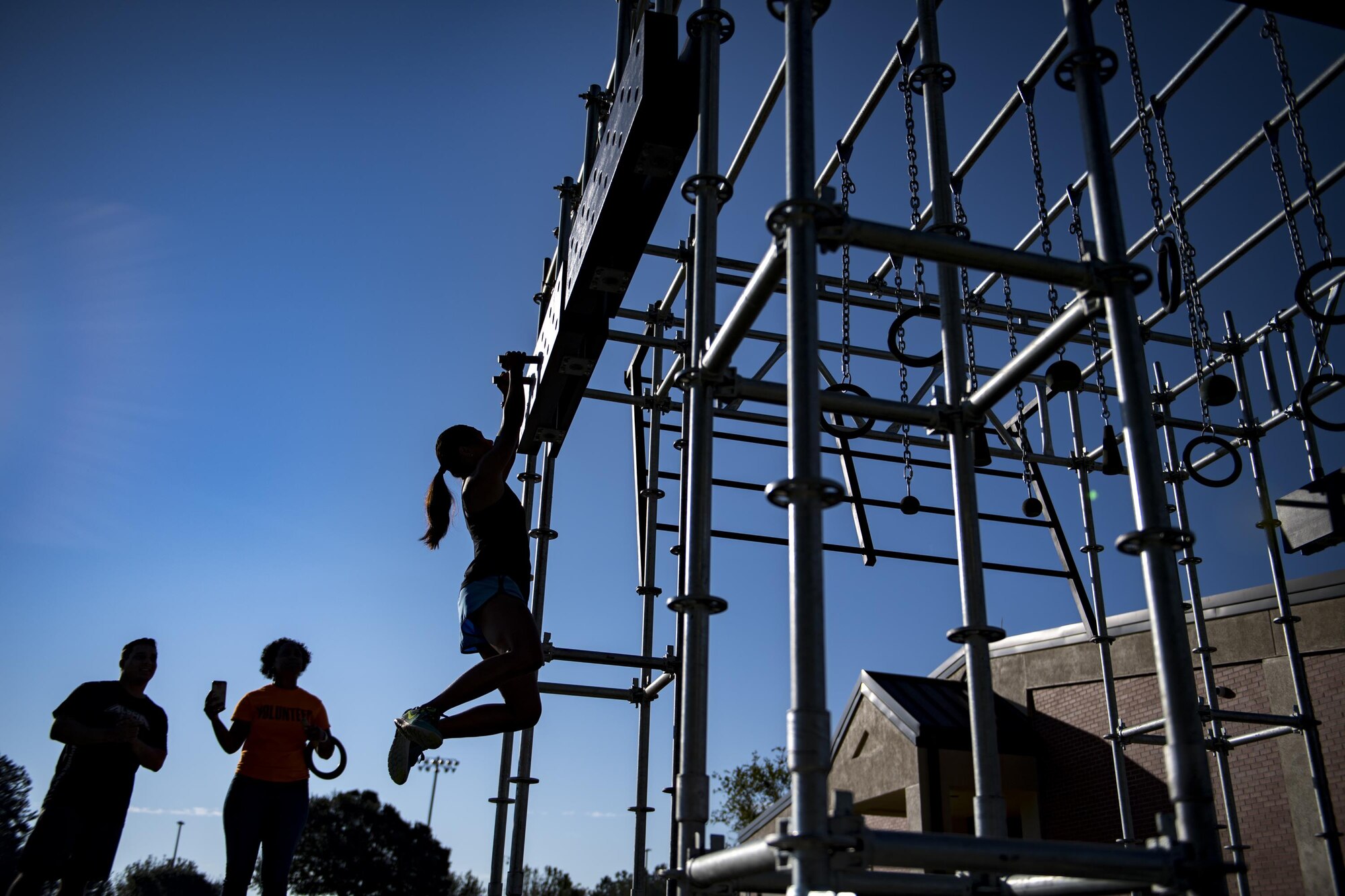 Tech. Sgt. Vanessa Spry, an Alpha Warrior competitor, navigates an obstacle during a qualifying run through an Alpha Warrior battle rig, Sept. 27, 2017, at Moody Air Force Base, Ga. The Alpha Warrior program was adopted by the Air Force in support of the Comprehensive Airmen Fitness pillars: mental, social, physical and spiritual. (U.S. Air Force photo by Airman 1st Class Daniel Snider)