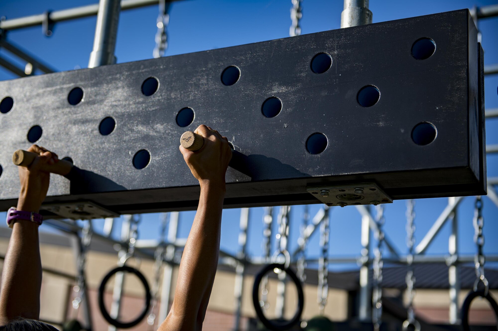 Tech Sgt. Vanessa Spry, an Alpha Warrior competitor, navigates an obstacle during a qualifying run through an Alpha Warrior battle rig, Sept. 27, 2017, at Moody Air Force Base, Ga. The Alpha Warrior program was adopted by the Air Force in support of the Comprehensive Airmen Fitness pillars: mental, social, physical and spiritual. (U.S. Air Force photo by Airman 1st Class Daniel Snider)