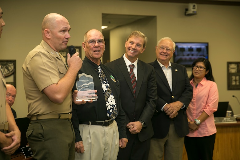 Col. Jay Wylie, assistant chief of staff, G-4 Installation and Logistics, speaks to members of the Mojave Desert Air Quality Management District at the MDAQMD headquarters, September 25, 2017. Wylie accepted an award on behalf of the Combat Center, which was granted to the installation for its dedication to using clean energy and reducing greenhouse gas emissions. (U.S. Marine Corps photo by Lance Cpl. Isaac Cantrell)