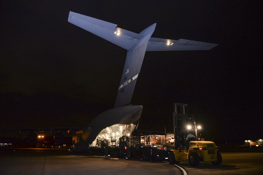 A C-17 Globemaster III is loaded with cargo Sept. 22 at North Island Naval Air Station, San Diego, Calif. At the request of Mexican civil authorities, the C-17 and its six-member crew from Travis Air Force Base, Calif., assisted U.S. efforts to provide humanitarian aid to Mexico by airlifting over 31,000 pounds of hygiene and medical supplies to the area after a 7.1-magnitude earthquake struck Mexico City Sept. 19.  (U.S. Air Force photo / 2nd Lt. Sarah Johnson