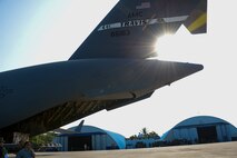 A C-17 Globemaster III is prepared for cargo downloading after arriving at Ixetepec Airport, Oaxaca, Mexico Sept. 22. At the request of Mexican civil authorities, the C-17 and its six-member crew from Travis Air Force Base, Calif., assisted U.S. efforts to provide humanitarian aid to Mexico by airlifting over 31,000 pounds of hygiene and medical supplies to the area after a 7.1-magnitude earthquake struck Mexico City Sept. 19. (U.S. Air Force photo / 2nd Lt. Sarah Johnson)