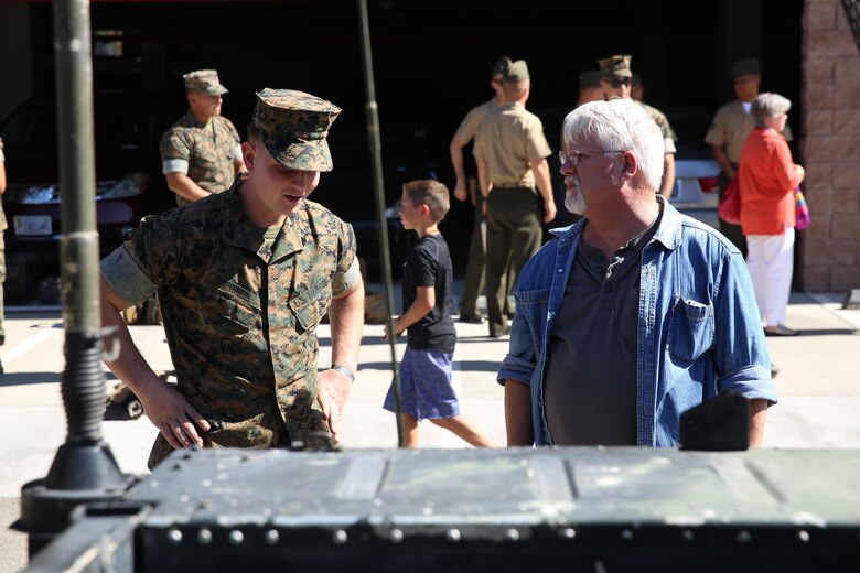 A Marine with 3/11 speaks with a member of the 3/11 Association about his time in the Marine Corps aboard the Marine Corps Air Ground Combat Center in Twentynine Palms, Calif., September 21, 2017. The 3/11 Association is a program that keeps veterans together and involved in the Marine Corps after their service. (U.S. Marine Corps photo by Lance Cpl. Christian Lopez)