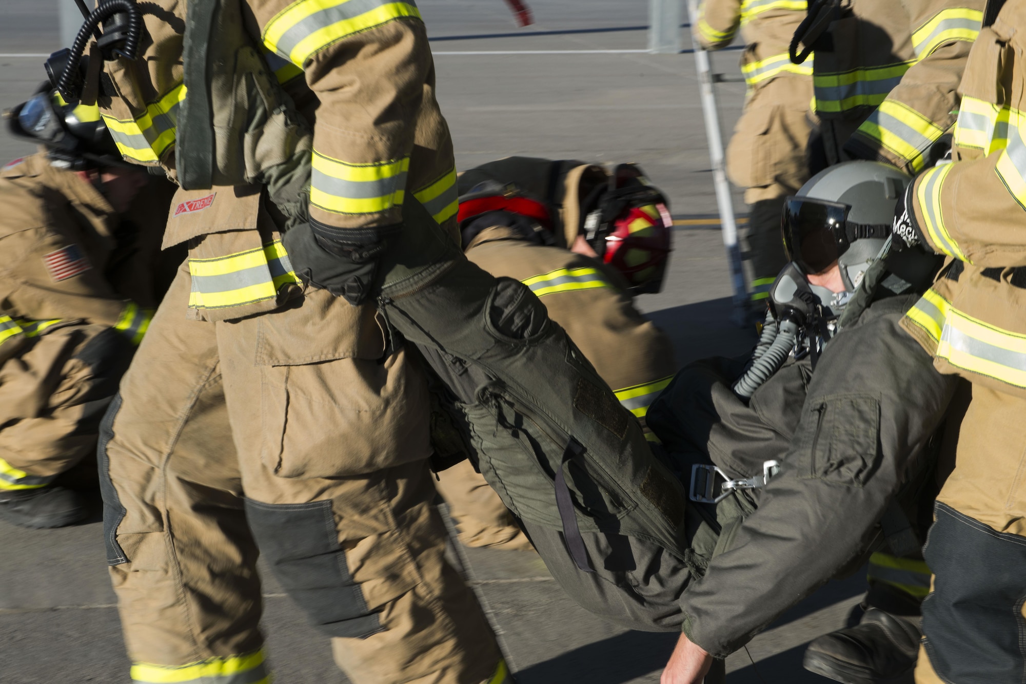 While one airman simulated unconciousness, another fained responsiveness and first responders had to treat their symptoms.