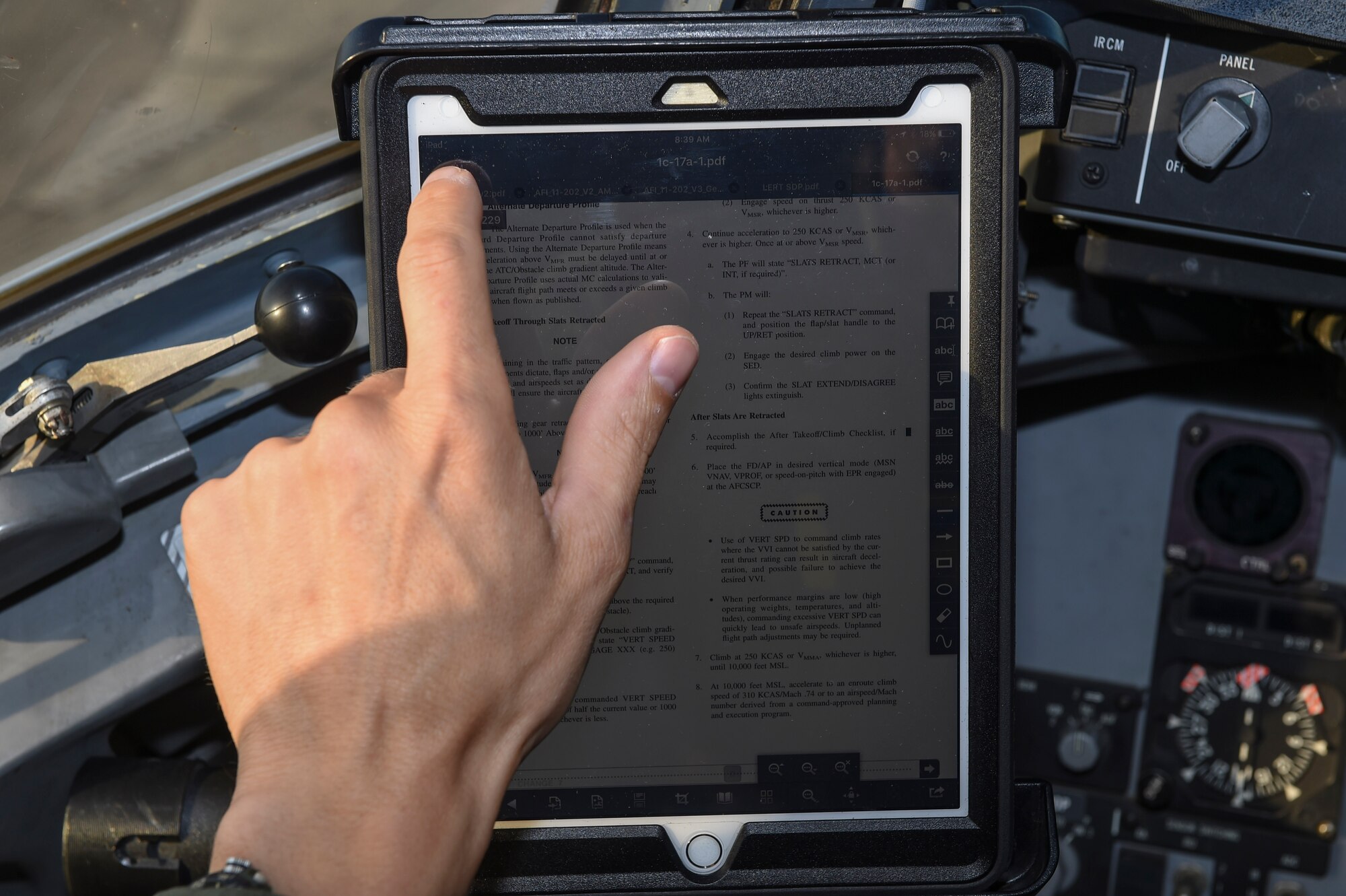 Lt. Col. Thomas Clark, 437th Operations Group deputy chief of standards and evaluations, uses the new Electronic Flight Bag mount modification on the flightline in Joint Base Charleston, S.C., Sept. 29, 2017.