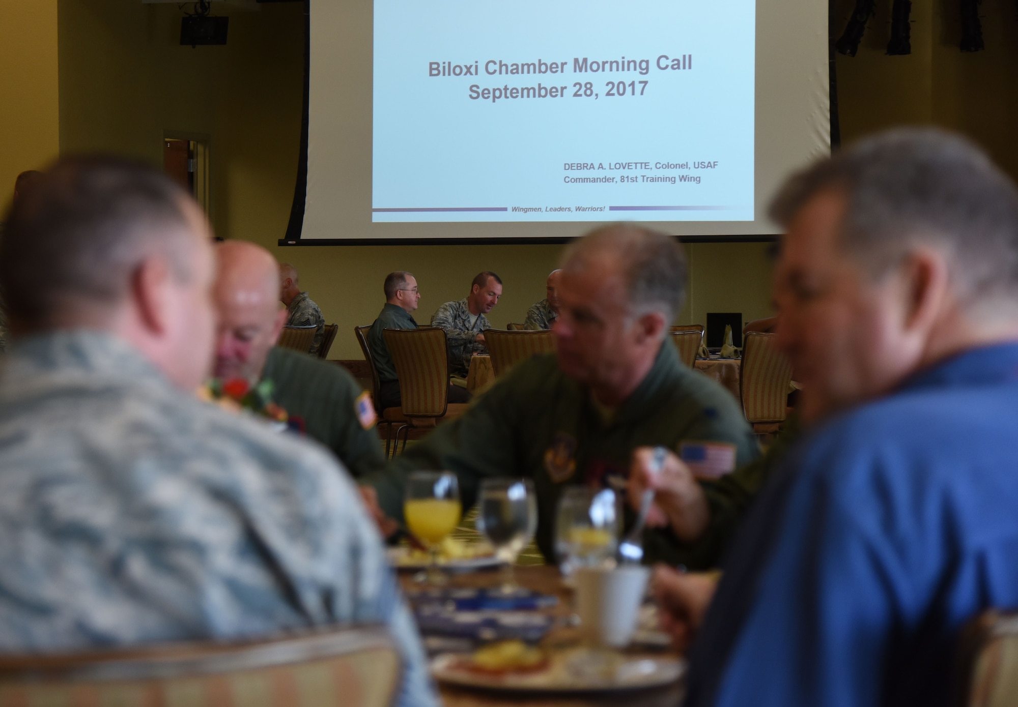 Members of Keesler Air Force Base and the local community attend the Biloxi Chamber Morning Call at the Bay Breeze Event Center Sept. 28, 2017, on Keesler AFB, Mississippi. Local business and community leaders attended the event to learn more about the base’s mission and its Airmen. During the event, hosted by the 81st Training Wing, members of the 334th Training Squadron drill team performed and several Keesler Airmen shared their story about why they joined the Air Force. (U.S. Air Force photo by Kemberly Groue)