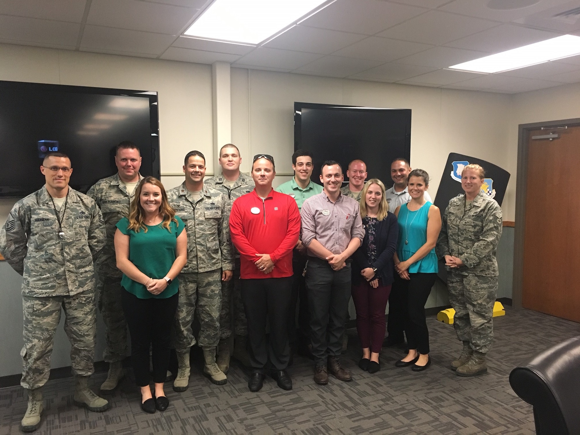 Airmen from the 22nd Maintenance Group pose for a photo with Chick-fil-A members June 27, 2017, at McConnell Air Force Base, Kansas. The group came together to talk about leadership topics and different ways to enhance the relationship between the base and the community. (Courtesy photo)
