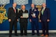 From left to right, The Honorable Kenneth P. Rapuano, Assistant Secretary of Defense for Homeland Defense and Global Security, Bob Cronan, the flight chief of readiness and emergency management, and Master Sgt. Timothy Bricker, the superintendent of the emergent readiness flight, both assigned to the 28th Civil Engineer Squadron, and Mr. Robert G. Salesses, the Deputy Assistant Secretary of Defense for Homeland take a group photo during an award ceremony in the Pentagon Hall of Heroes, Washington, D.C., Sept. 24, 2017. Recognized for their efforts and cooperation, the Airmen of emergency management, explosive ordnance disposal and the fire department worked together to achieve and exceed the national preparedness goal, resiliency throughout the nation. (U.S. Air Courtesy Photo)