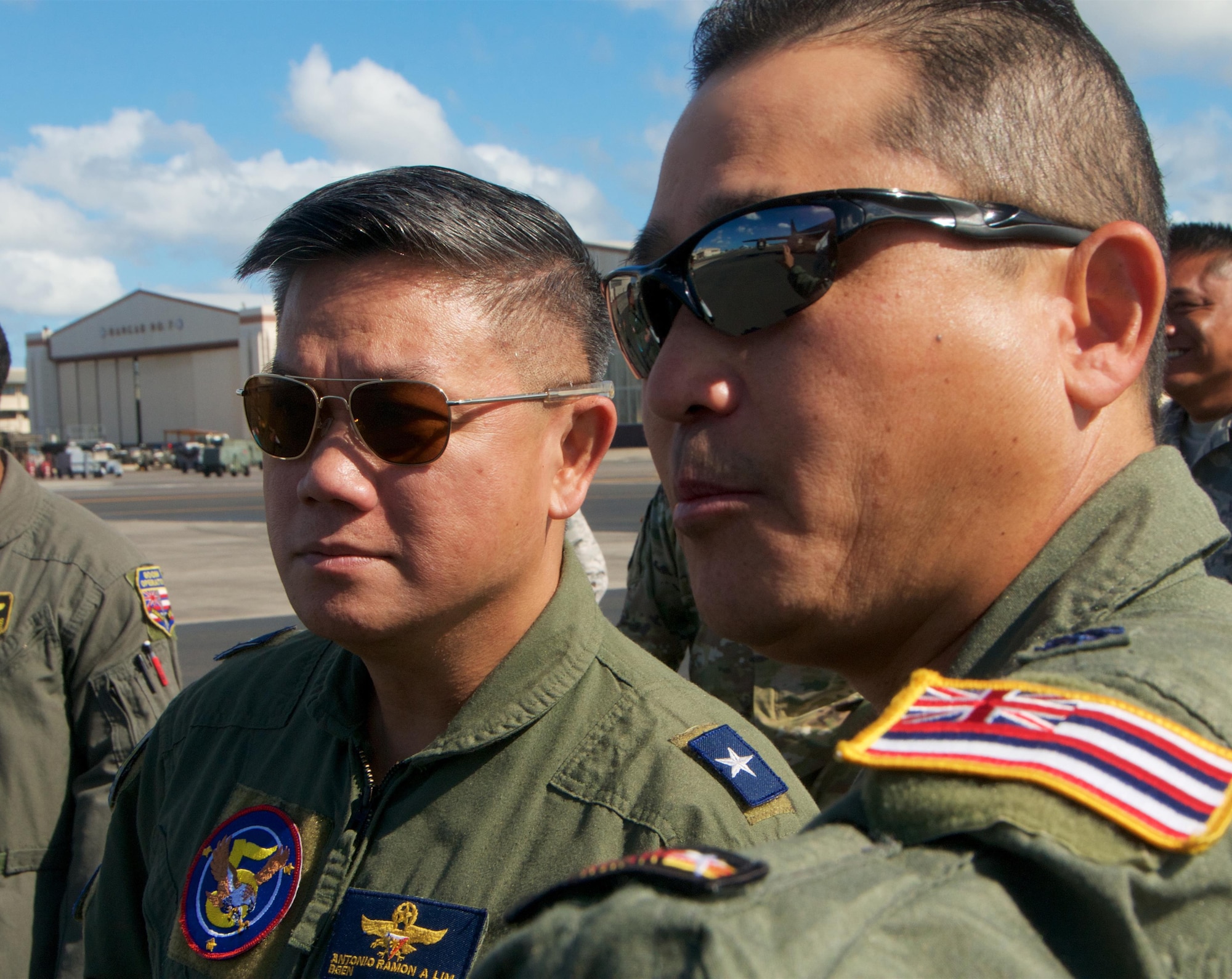 Philippine Air Force Brig. Gen. Antonio Ramon Lim, commander, 5th Fighter Wing, PAF and U.S. Air Force Lt. Col. Scott Oka, commander, 203rd Air Refueling Squadron, Hawaii Air National Guard discuss the capabilities of the KC-135 Stratotanker