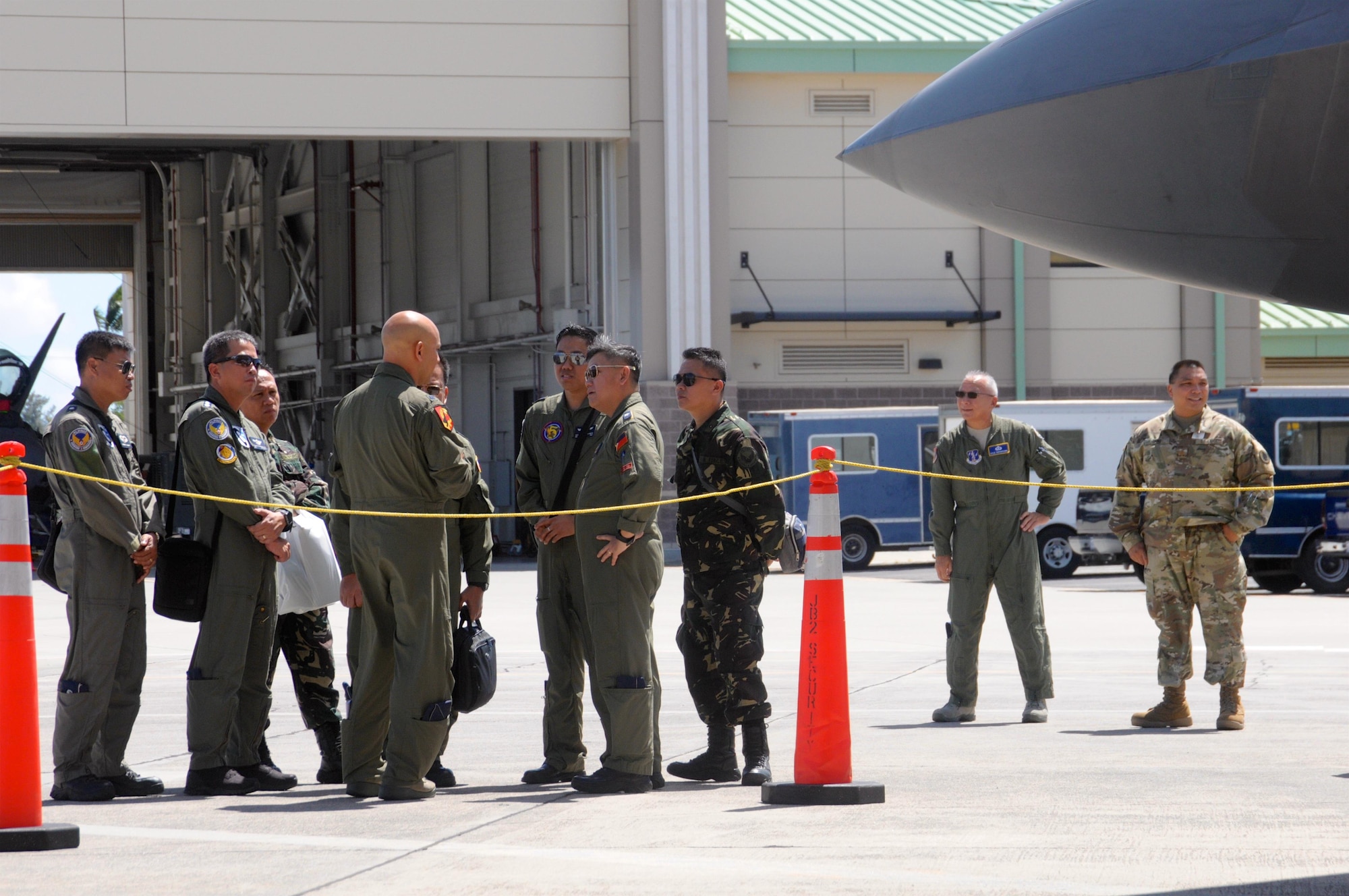 Members of the Philippine Air Force receive a briefing and tour of Hawaii Air National F-22 Raptor operations and facilities
