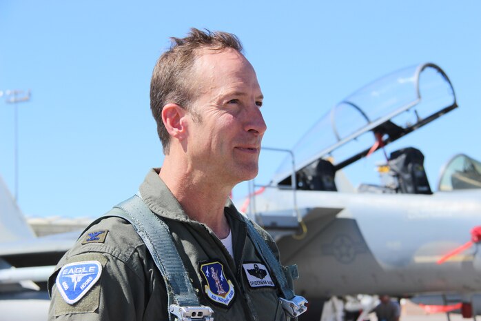 Col. Brian Kamp, Air National Guard advisor to the U.S. Air Force Warfare Center, displays his F-15C Eagle 4,000 flight-hours patch September 27, 2017, at Nellis Air Force Base, Nevada. Kamp has flown more than 3,000 sorties in an F-15C during his 28-year piloting career. (U.S. Air Force photo by Susan Garcia/Released)