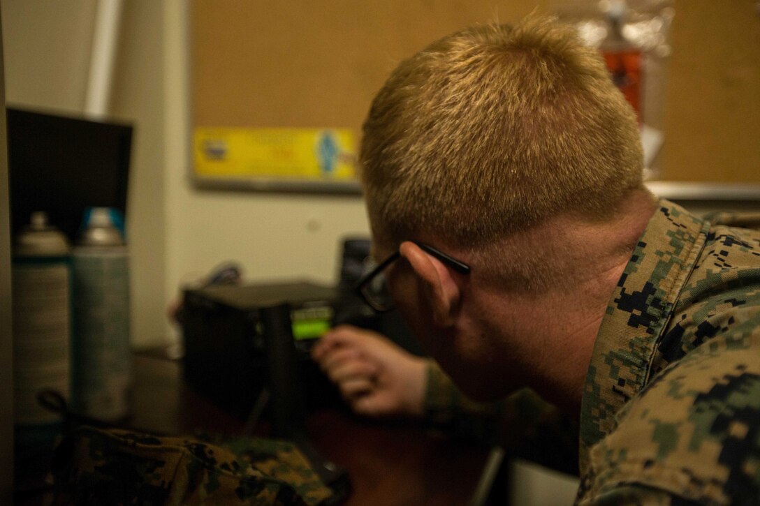 U.S. Marine Cpl. Trenton J. Gallion, a communications technician with the Air Traffic Control Mobile Team, 26th Marine Expeditionary Unit (MEU), tests a radio for serviceability during a reassessment of medical and operational needs previously requested as part of the relief efforts for victims of Hurricane Maria at HIMA San Pablo Hospital, Ceiba, Puerto Rico, Sept. 29, 2017. The 26th MEU is supporting the Federal Emergency Management Agency, the lead federal agency, and local authorities in Puerto Rico with the combined goal of protecting the lives and safety of those in affected areas. (U.S. Marine Corps photo by Lance Cpl. Tojyea G. Matally)