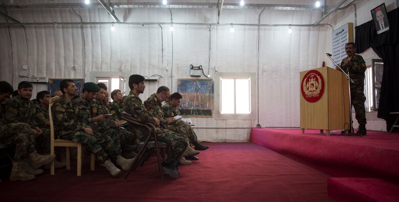 Col. Hasan Gul, the Afghan National Army 215th Corps G-1, holds a meeting with the soldiers of the 1st Brigade near New Garm Ser, Afghanistan, Sept. 26, 2017. The meeting was held to solve promotion, leave and pay issues at the brigade level. As part of the new U.S. South Asia strategy, Marines are advising down to the brigade- and kandak-levels where necessary to support Afghan National Defense and Security Force operations. (U.S. Marine Corps photo by Sgt. Justin T. Updegraff)