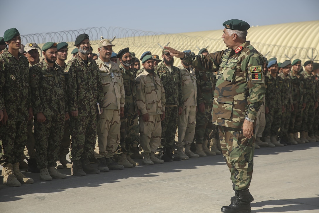 Afghan National Army Brig. Gen. Ghani, the executive officer of 215th Corps, speaks to soldiers with 3rd Brigade, 215th Corps during Operation Maiwand Six near Gereshk, Afghanistan, Sept. 27, 2017. Multiple elements of the Afghan National Defense and Security Forces are working to clear Gereshk and surrounding areas of enemy presence. U.S. Marine advisors are assisting their Afghan counterparts throughout the operation, helping to enhance security and stability for the local populace. (U.S. Marine Corps photo by Sgt. Lucas Hopkins)