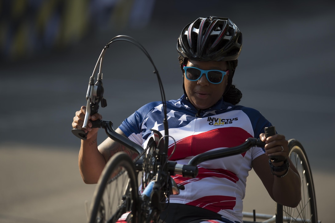 Army Spc. Stephanie Morris powers a hand cycle during the morning start of cycling at the 2017 Invictus Games in Toronto, Sept. 27, 2017. DoD photo by EJ Hersom