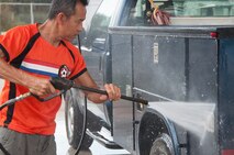 796th Civil Engineer Squadron range maintenance specialist, takes a few minutes at the end of the day to clean his utility vehicle