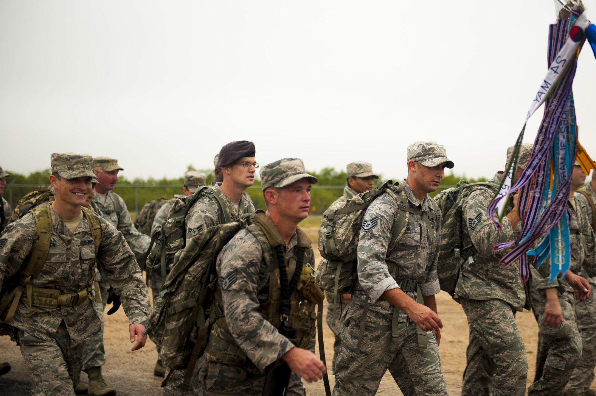 U.S. Air Force Staff Sgt. Dakoda Riddle, 17th Security Forces K9 handler, marches the perimeter during the Jacobson ruck march on Goodfellow Air Force Base, Texas, Sept. 28, 2017. The ruck march is an annual event to honor Airman 1st Class Elizabeth Jacobson for paying the ultimate sacrifice on her deployment in Iraq, 12 years ago. (U.S. Air Force photo by Senior Airman Scott Jackson/Released)