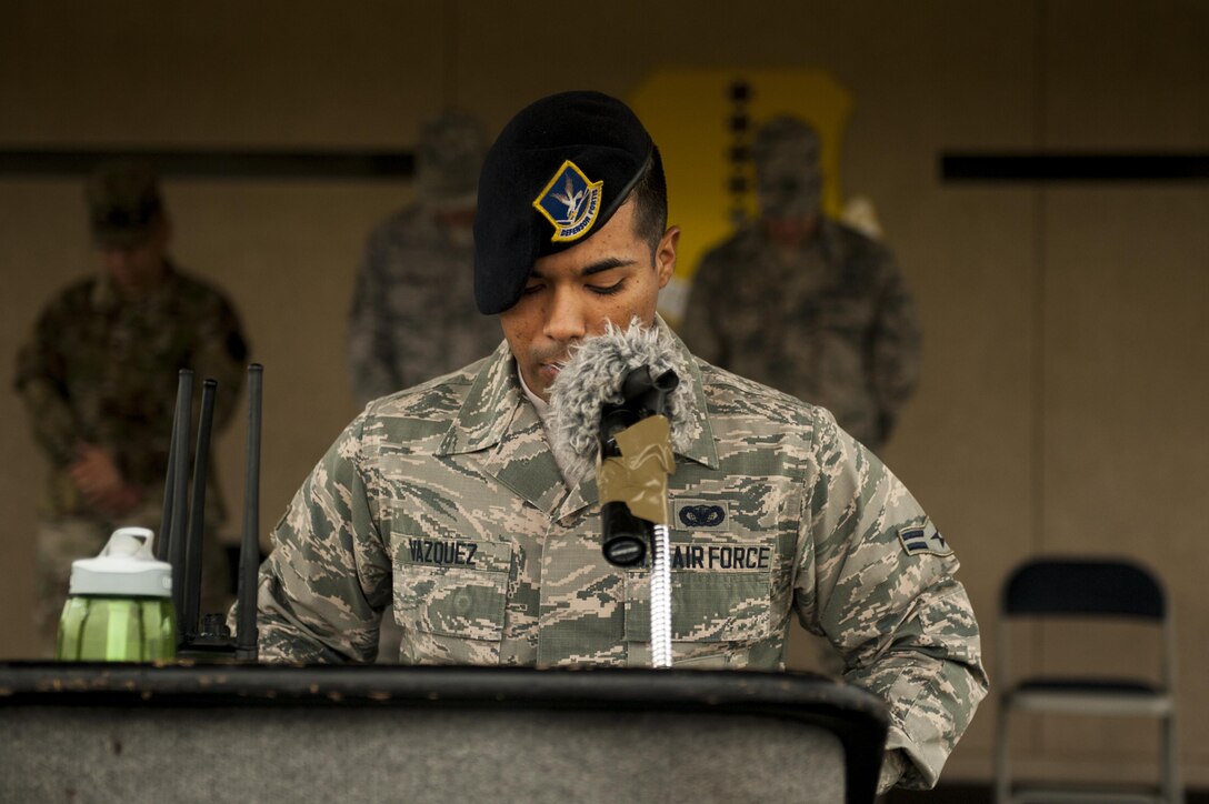 U.S. Air Force Airman 1st Class Luis Vazquez, 17th Security Forces Squadron installation entry controller, finished the Jacobson ruck march with a prayer on the parade filed at Goodfellow Air Force Base, Texas, Sept. 28, 2017. The march went around Goodfellow’s perimeter and each volunteer carried 21 lbs symbolizing Jacobson’s age at the time of her death. (U.S. Air Force photo by Senior Airman Scott Jackson/Released)
