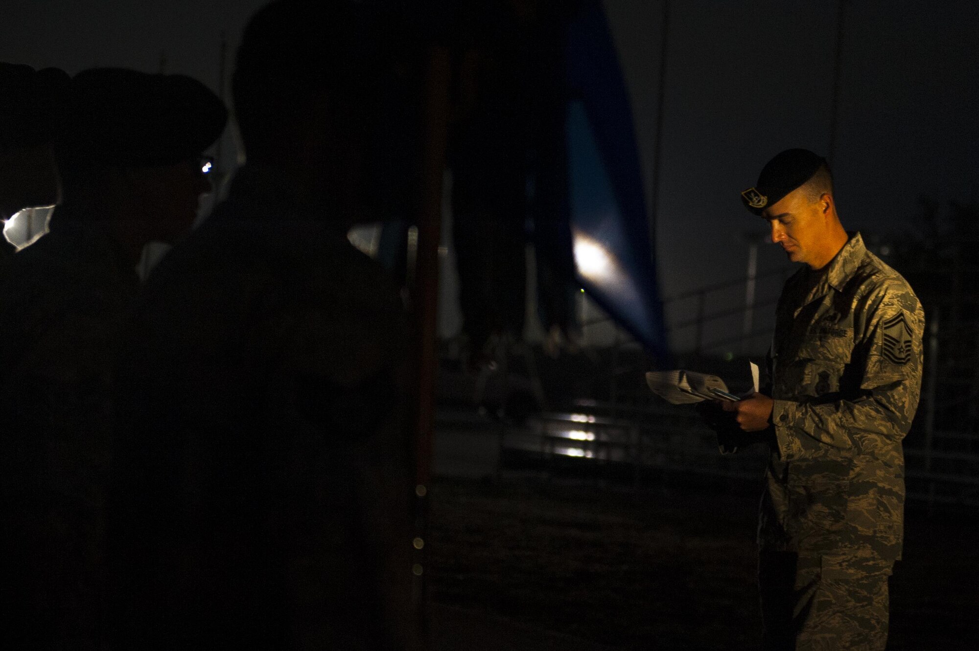 U.S. Air Force Senior Master Sgt. Russell Weatherby, 17th Security Forces Squadron individual mobilization augmenter, takes attendance during the Jacobson ruck march at the parade field on Goodfellow Air Force Base, Texas, Sept. 28, 2017. Weatherby took roll call until the name fell on Jacobson, then returned to formation and led the flight on a ruck march around base. Weatherby led Jacobson’s fire team and was present when she was killed. (U.S. Air Force photo by Senior Airman Scott Jackson/Released)