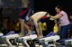 U.S. Coast Guard Petty Officer 1st Class Rob Troha, an intelligence specialist and member of Team U.S. at the 2017 Invictus Games is steadied by his wife moments before his swimming event at the Pan Am Sports Centre Toronto, Canada Sept. 28, 2017. Troha, who suffers from a degenerative brain disorder, also competed in seated discus and shotput in this year’s games. (U.S. Air Force photo by Staff Sgt. Chip Pons)