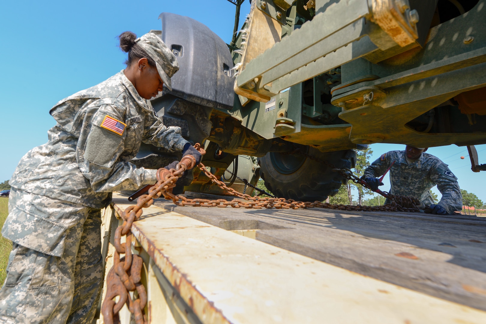 U.S. Army Spc. Lachanda Jackson, a construction engineer assigned to the 178th Engineer Battalion, South Carolina Army National Guard, unloads heavy equipment for transport to Puerto Rico at McEntire Joint National Guard Base. S.C. Sept. 29, 2017.