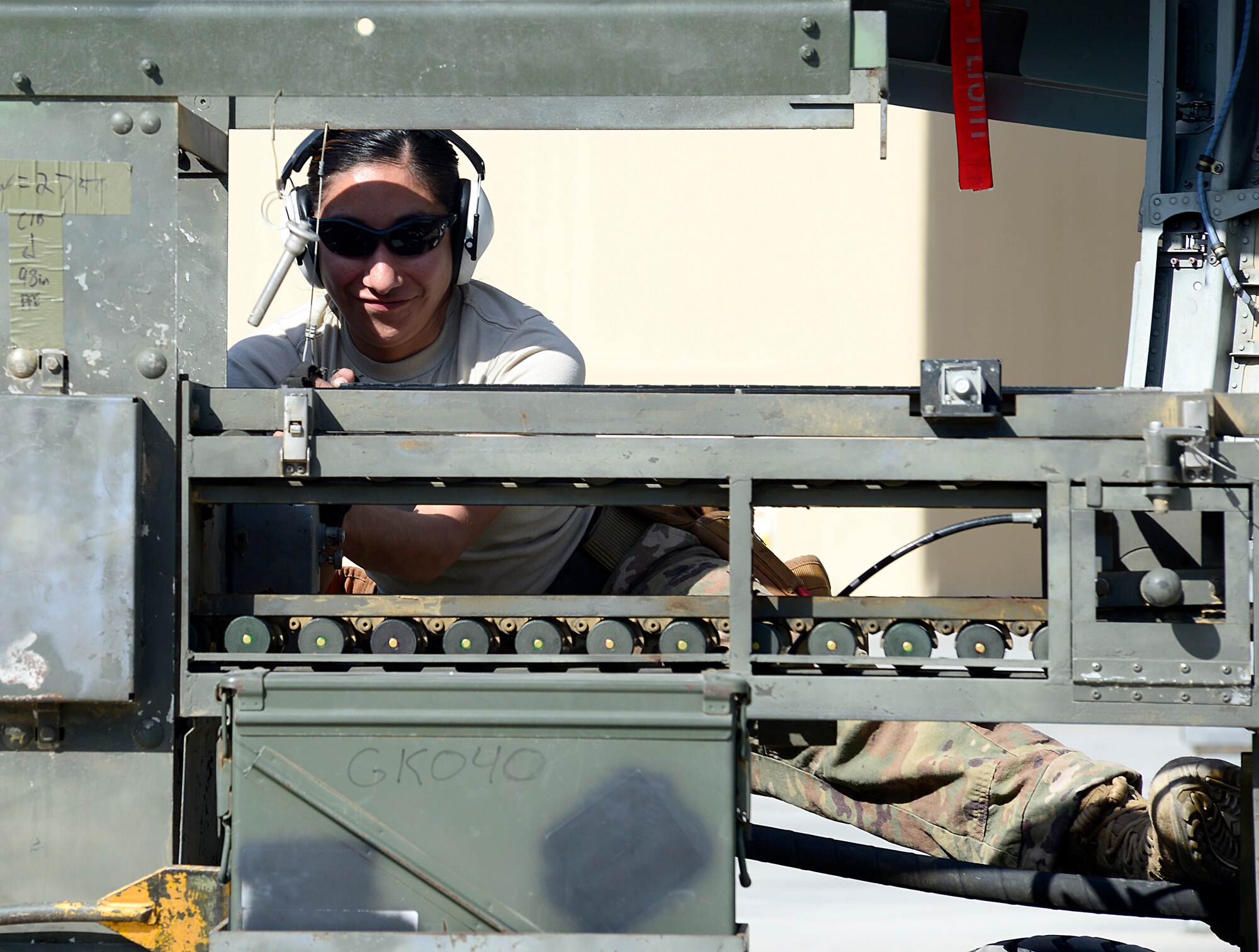 A weapons loader assigned to the 451st Expeditionary Aircraft Maintenance Squadron, prepares to reload the 30mm gun on an A-10 Thunderbolt II before a mission, March 22, 2018, at Kandahar Airfield, Afghanistan.