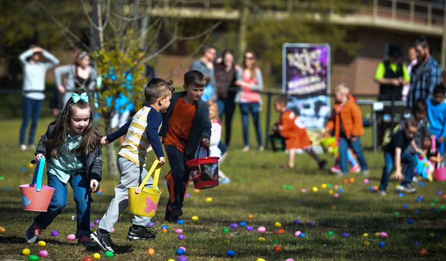 Team Shaw children hunt for Easter eggs during a Month of the Military Child (MOMC) celebration at Shaw Air Force Base, S.C., March 31, 2018.