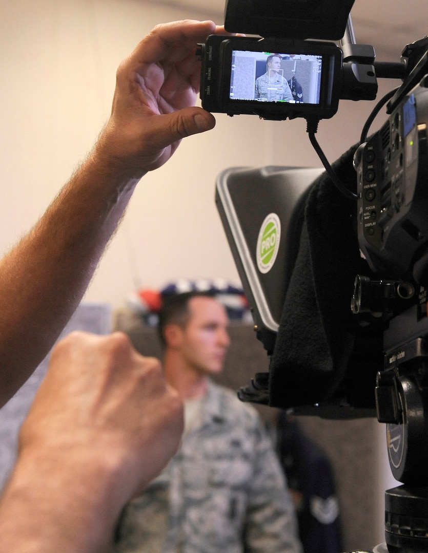 The videographer adjusts the camera angle during the filming of the “What Now” series for Defenders, Joint Base San Antonio-Randolph, Texas, March 19, 2018. The Defender training video is being developed to support the new Air Force Global Strike Command Security Forces New Supervisor Workshop and other Security Force units in the Air Force. (U. S. Air Force photo by Tech. Sgt. Ave I. Young)