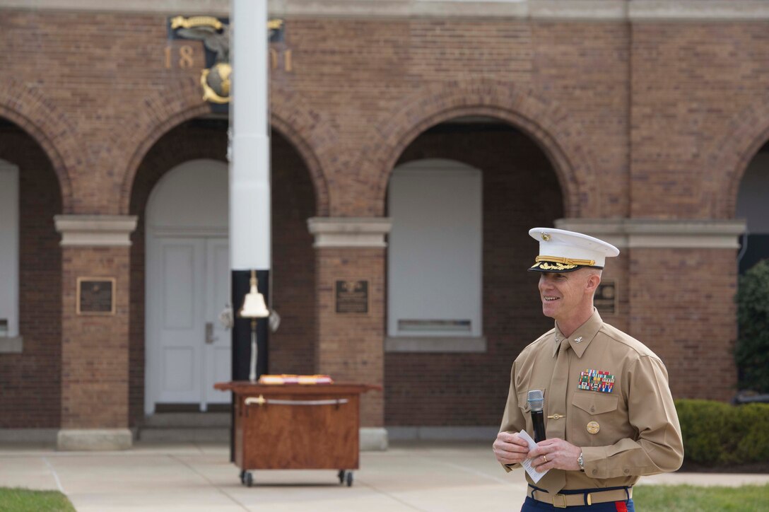 Colonel Tyler J. Zagurski, commanding officer, Marine Barracks Washington, speaks to the Marines of MBW and veterans with the Center House Association, at Marine Barracks Washington, Washington D.C., March 29, 2018. The Barracks hosted the celebration for its 217th Birthday at the parade deck, which included a cake cutting ceremony, and performances by the U.S. Marine Corps Color Guard and "The President's Own" U.S. Marine Band. In attendance were Marine Corps veterans with the Center House Association and Marines of MBW. (U.S. Marine Corps Photo by Pfc. James Bourgeois/Released)