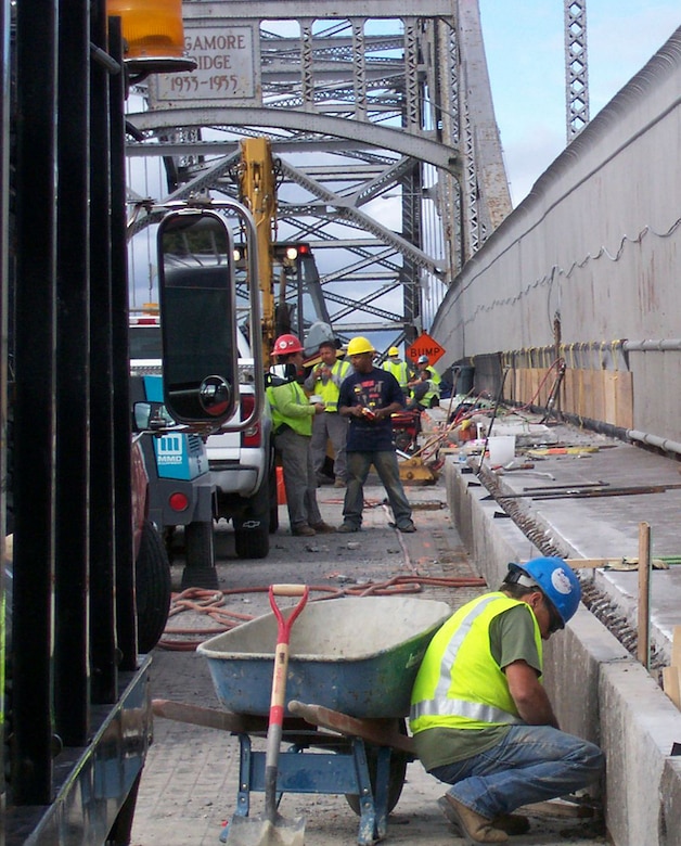 Contractors perform work on the Sagamore Bridge in this September 9, 2009 photo.