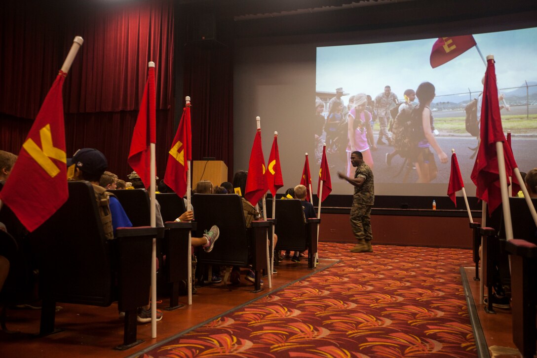 Sgt. Maj. Juarice Collins, sergeant major, Marine Corps Air Station Kaneohe Bay, recites the senior drill instructor speech during ‘Operation Ooh-Rah Kids’, Marine Corps Base Hawaii (MCBH), March 23, 2018. MCBH Marines and Sailors volunteer each year to give the children a chance to experience what it’s like to be a Marine. (U.S. Marine Corps photo by Lance Cpl. Matthew Kirk)