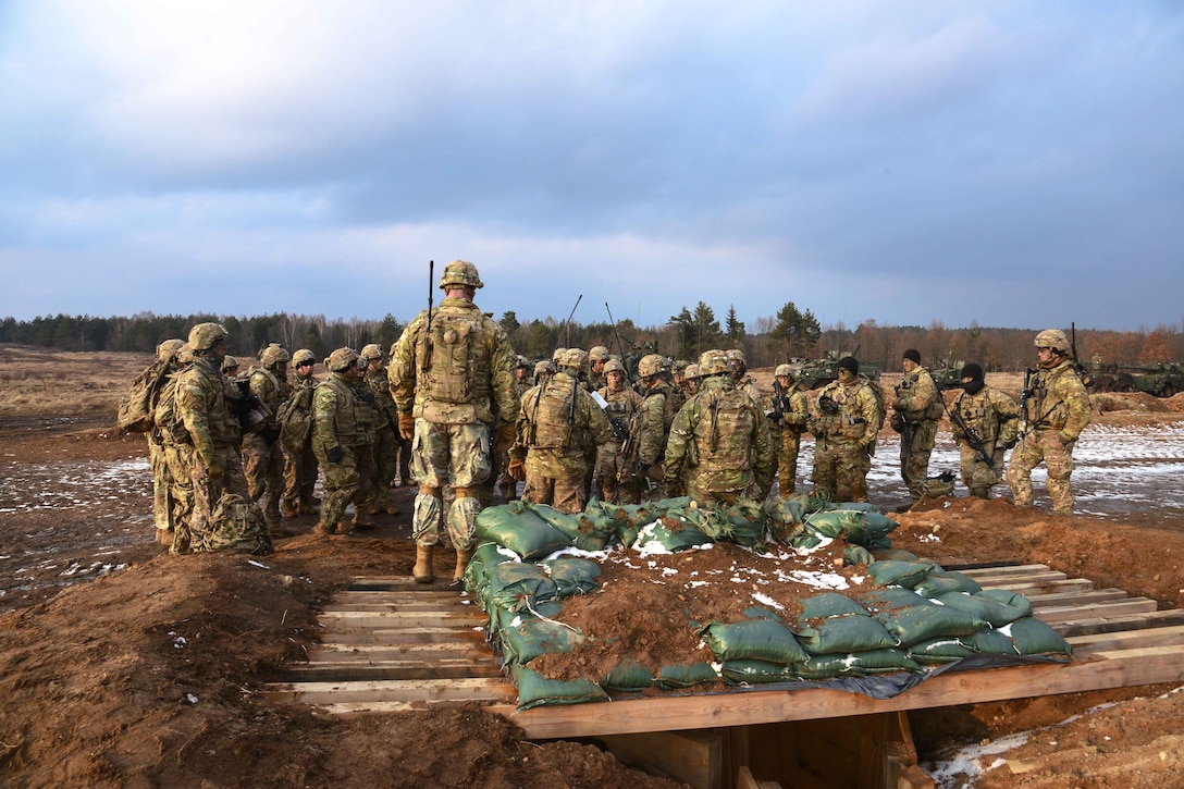 Soldiers conducts an after action review.