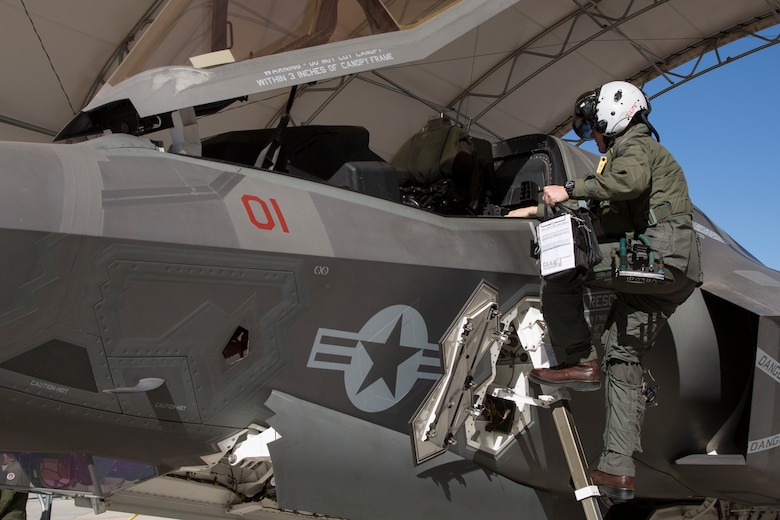 The Commanding Officer of Marine Fighter Attack Squadron 122 (VMFA-122), Lt. Col. John P. Price, enters his aircraft in preperation of VMFA-122's first flight operations in an F-35B Lightning II on Marine Corps Air Station (MCAS) Yuma, Ariz., March 29, 2018. VMFA-122 is conducting the flight operations for the first time as an F-35 squadron.