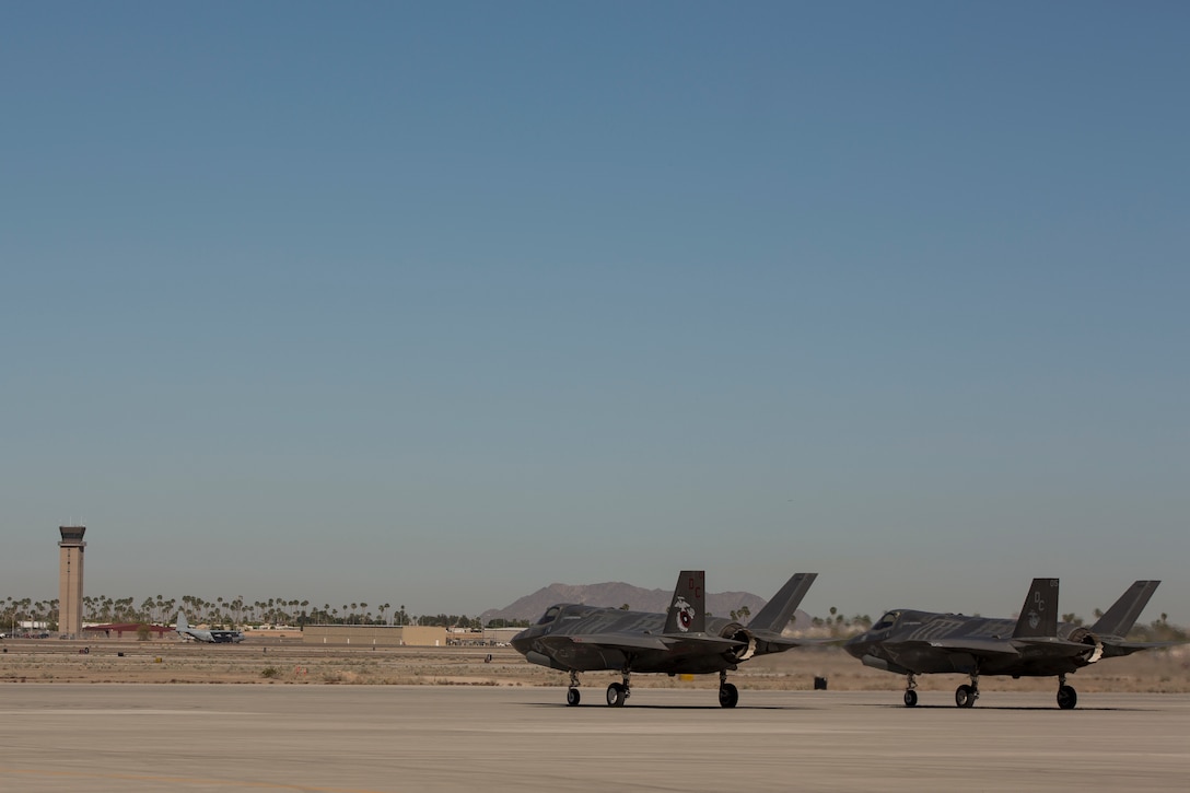 The Commanding Officer of Marine Fighter Attack Squadron 122 (VMFA-122), Lt. Col. John P. Price, and Maintenance Officer of VMFA-122, Maj. Christopher J. Kelly, prepare for VMFA-122's first flight operations in an F-35B Lightning II on Marine Corps Air Station (MCAS) Yuma, Ariz., March 29, 2018. VMFA-122 is conducting the flight operations for the first time as an F-35 squadron.