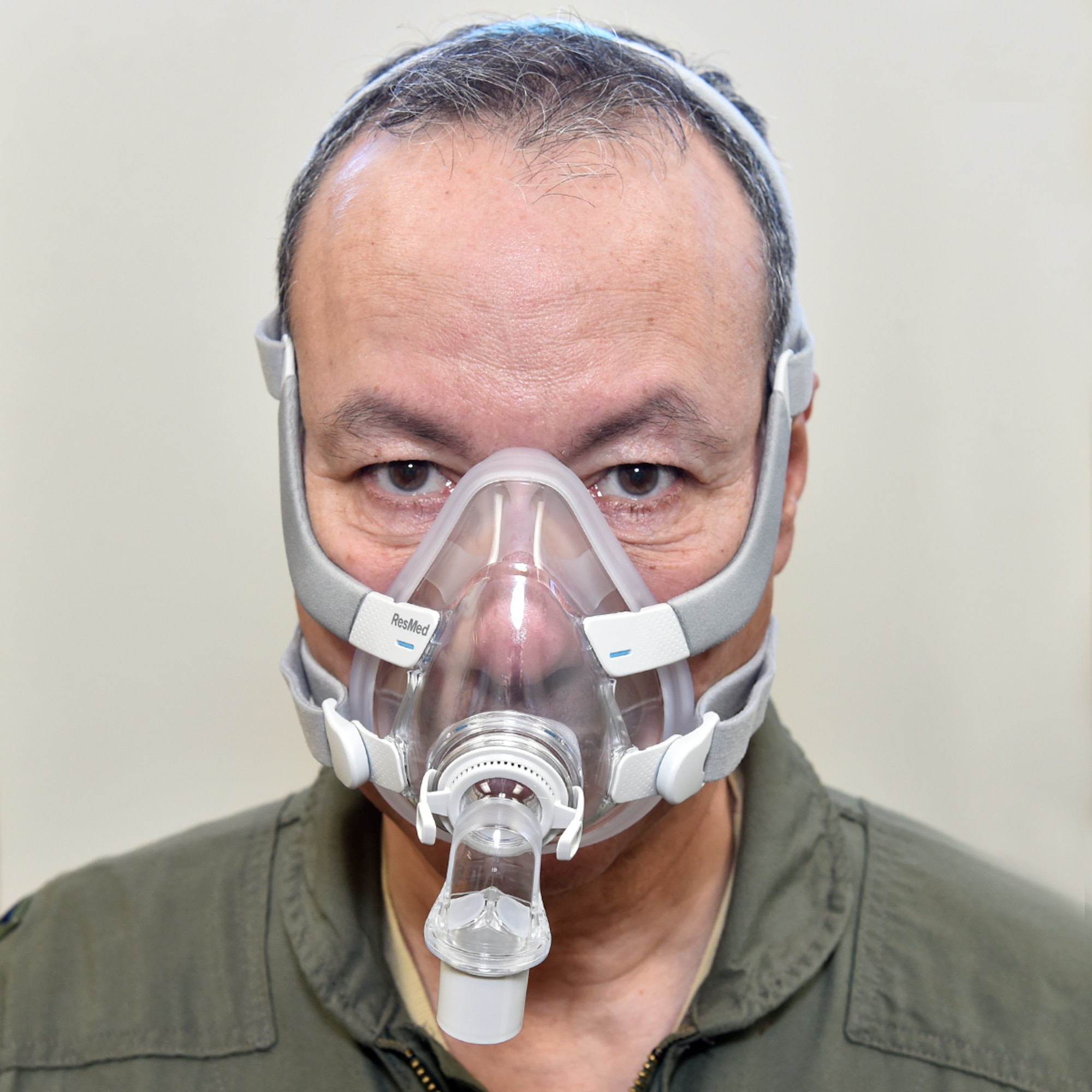 Lt. Col. (Dr.) Al. M. Elsayed von Bayreuth wears continuous positive airway pressure full face mask found in the Travis Kit.
