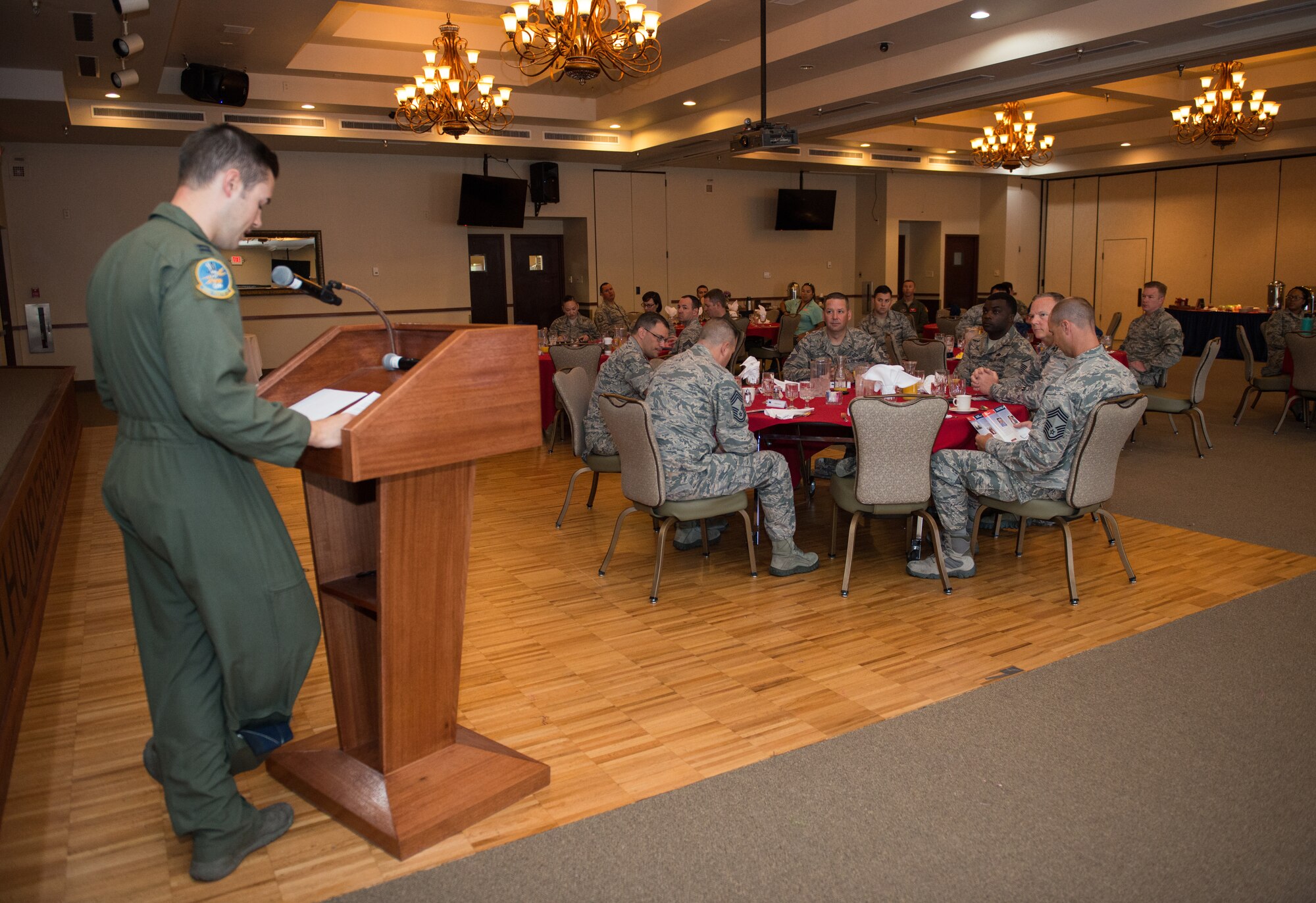 Capt. Daniel Hess, 310th Fighter Squadron, installation project officer, speaks to Thunderbolts during the Air Force Assistance Fund campaign kickoff breakfast at Luke Air Force Base, Ariz., April 2, 2018. The event officially kicked off the six-week campaign designed to assist Air Force personnel and their families. (U.S. Air Force photo by Airman 1st Class Alexander Cook)
